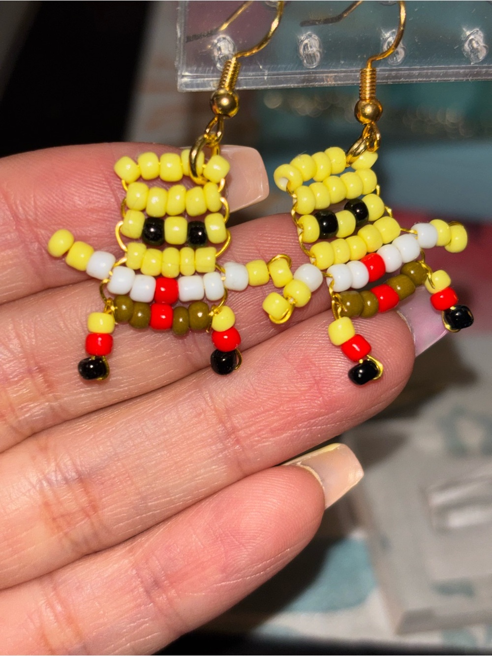 SpongeBob and Patrick handmade glass bead earrings.